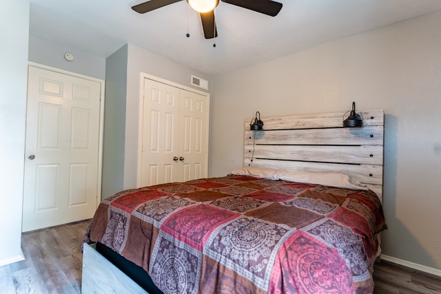 bedroom with ceiling fan, hardwood / wood-style flooring, and a closet