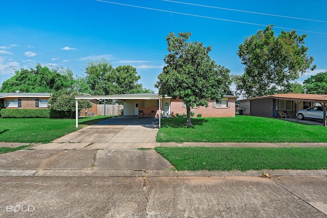 single story home with a front lawn