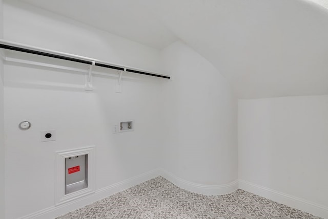 laundry area featuring laundry area, washer hookup, electric dryer hookup, and baseboards