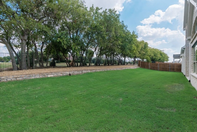 view of yard featuring fence