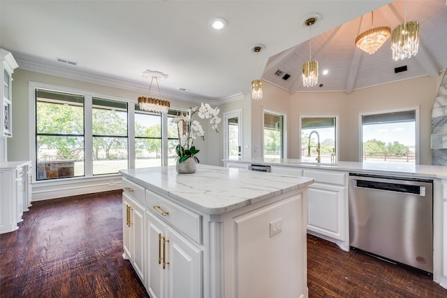 interior space with a wealth of natural light, crown molding, dark wood-type flooring, and an inviting chandelier