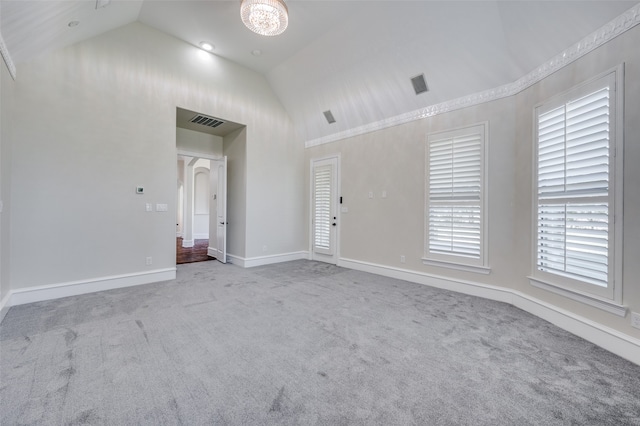 bathroom featuring a washtub, tile walls, and crown molding