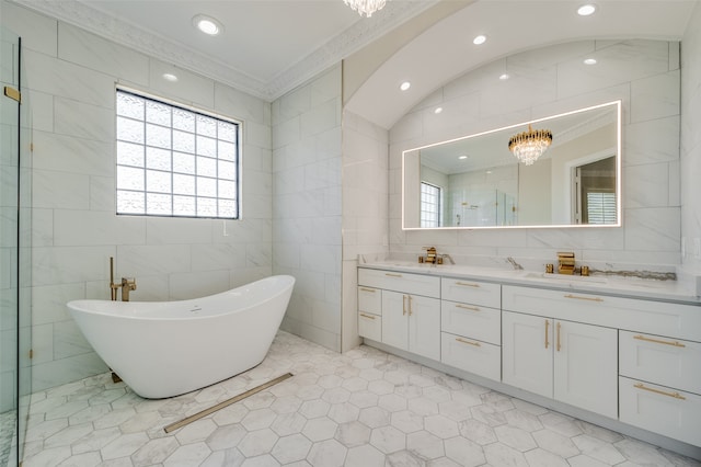 bathroom featuring crown molding, independent shower and bath, and tile walls