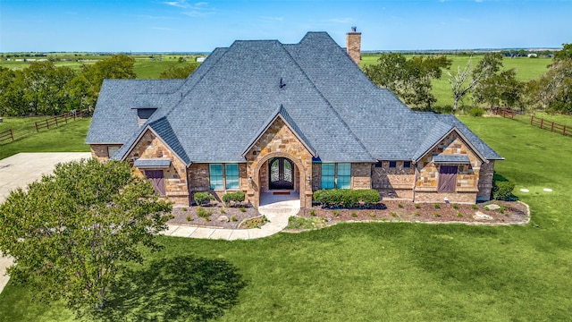 birds eye view of property featuring a rural view