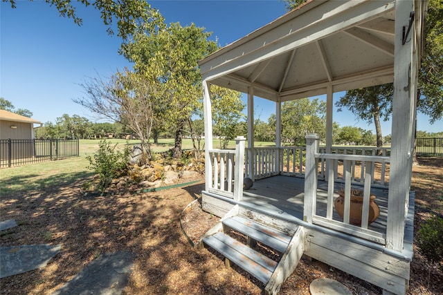 wooden deck featuring a gazebo