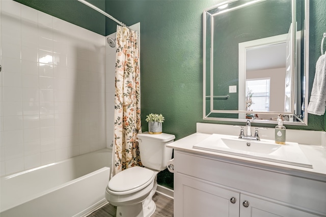 full bathroom with hardwood / wood-style floors, vanity, toilet, and shower / bath combination with curtain