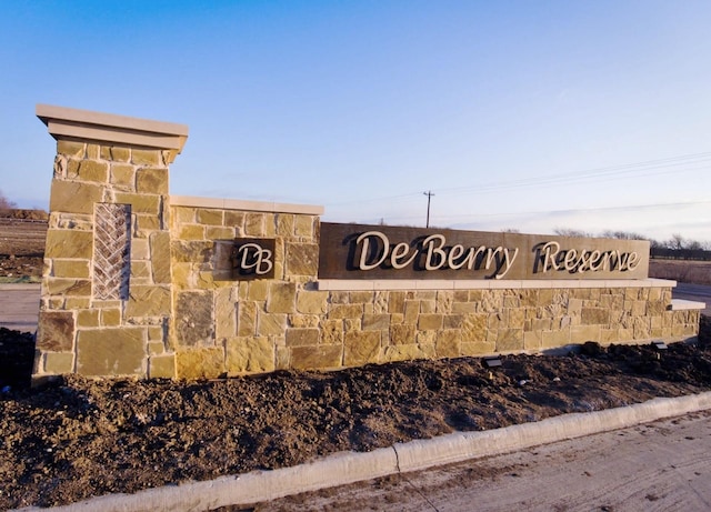 view of community sign