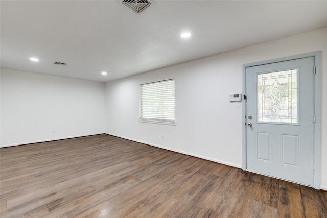 entryway with hardwood / wood-style floors