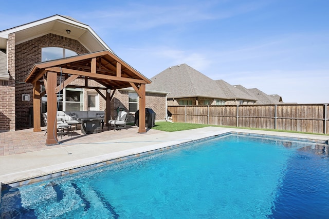 view of pool featuring a patio area