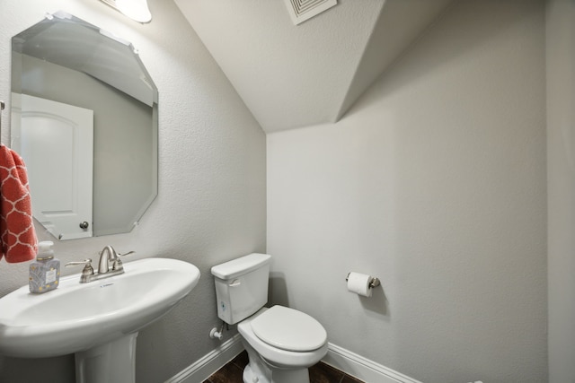 bathroom featuring sink and toilet