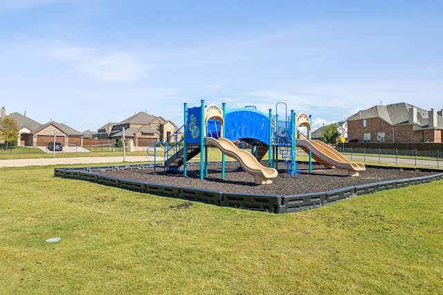 view of play area featuring a lawn