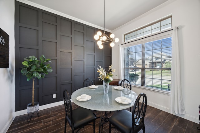 dining area featuring an inviting chandelier, crown molding, and dark hardwood / wood-style flooring