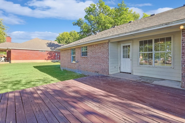 deck featuring a lawn