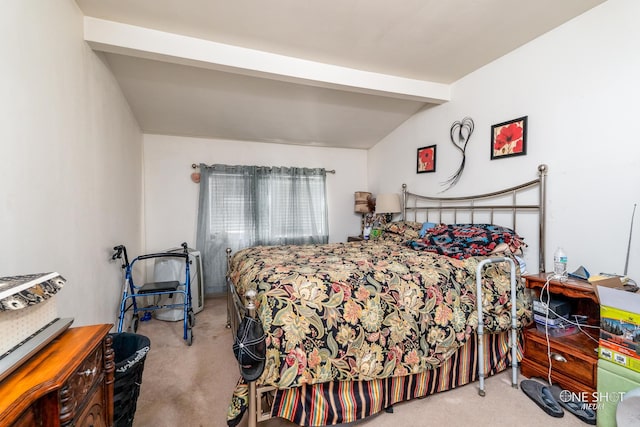 carpeted bedroom with vaulted ceiling