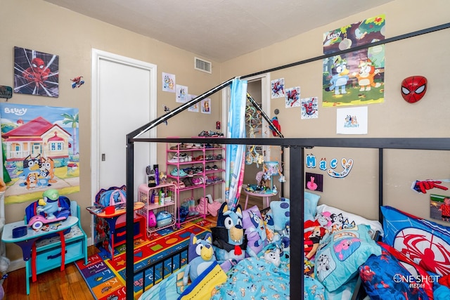 game room featuring hardwood / wood-style flooring