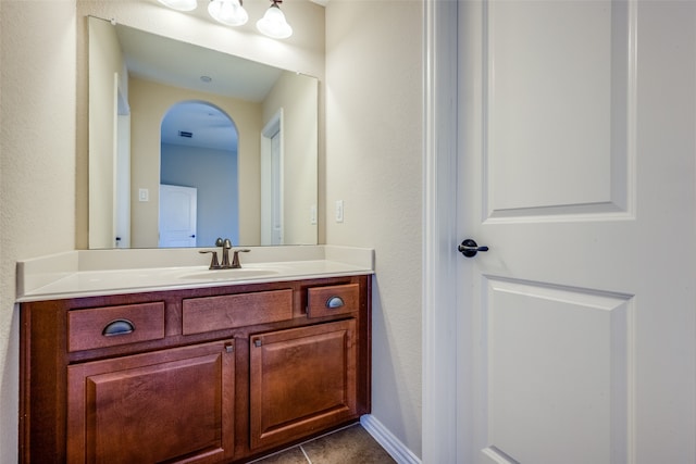 bathroom with vanity and tile patterned floors