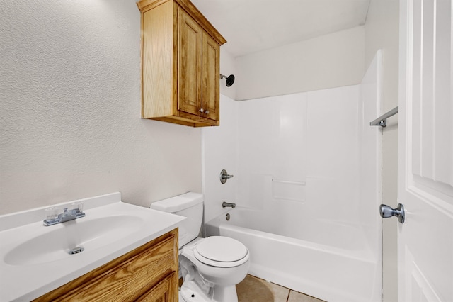 full bathroom with tile patterned flooring, shower / washtub combination, vanity, and toilet