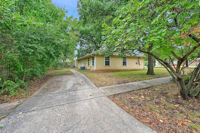 ranch-style home featuring central AC