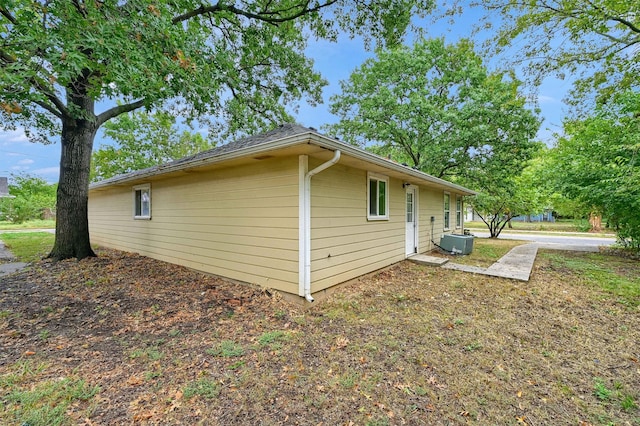 view of side of home with cooling unit