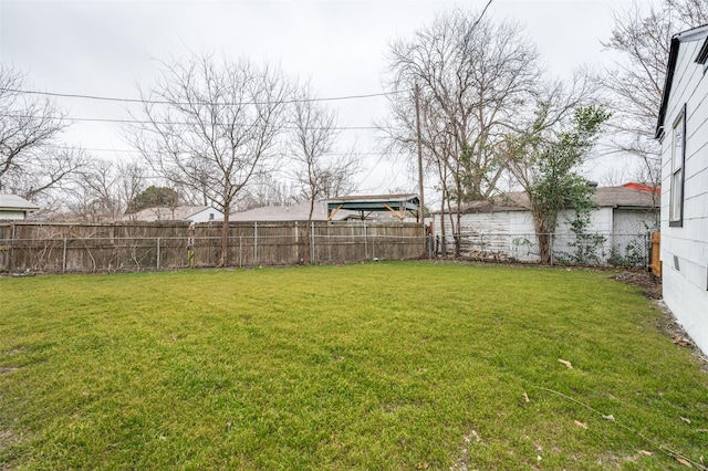 view of yard with a fenced backyard