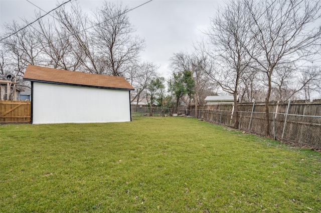 view of yard with a fenced backyard