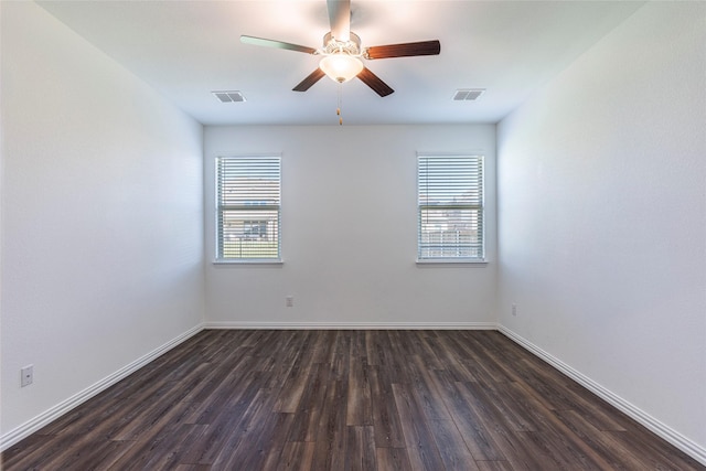 6049 Pensby Dr, Celina, TX 76227 - empty room with a wealth of natural light, visible vents, and dark wood-style floors