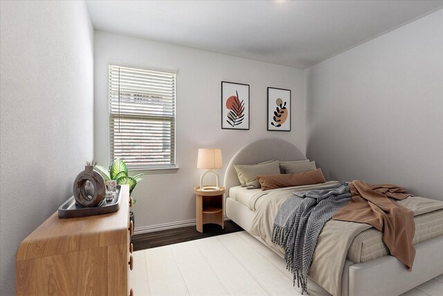 bedroom featuring hardwood / wood-style floors