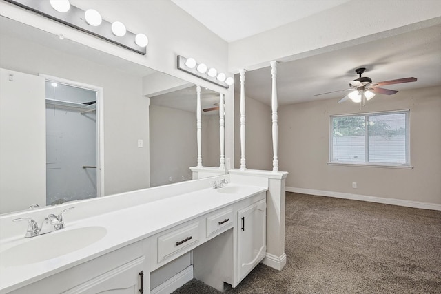 bathroom with ceiling fan and vanity