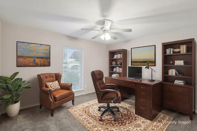 carpeted home office with ceiling fan