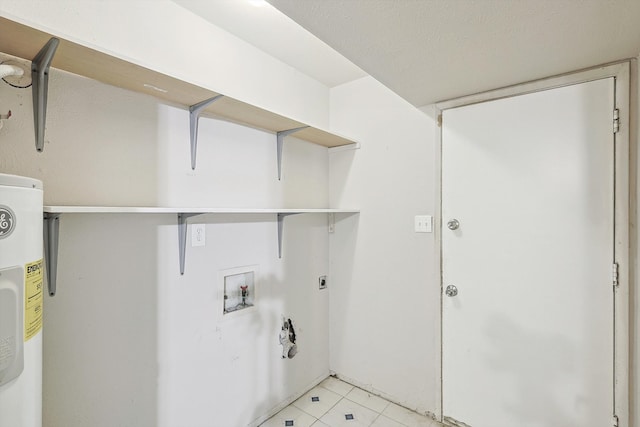 laundry room featuring washer hookup, water heater, a textured ceiling, and electric dryer hookup