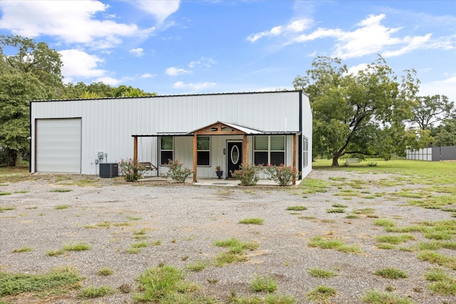 view of outbuilding with a garage