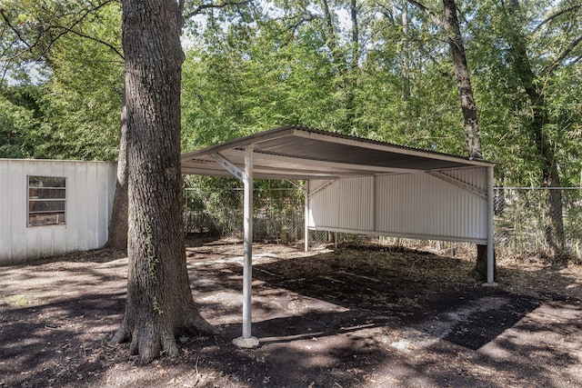 exterior space with a carport