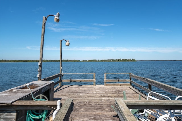 view of dock featuring a water view