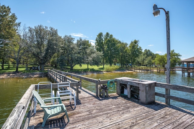 view of dock with a water view