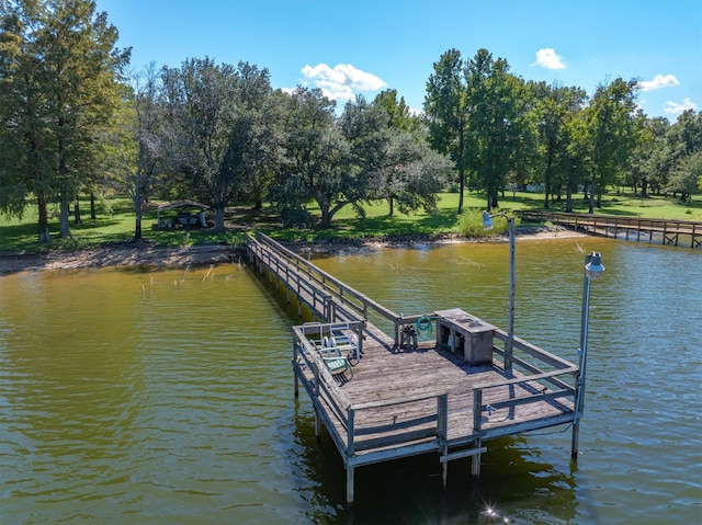 view of dock with a water view