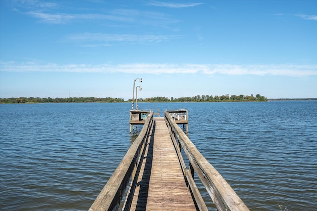 view of dock with a water view