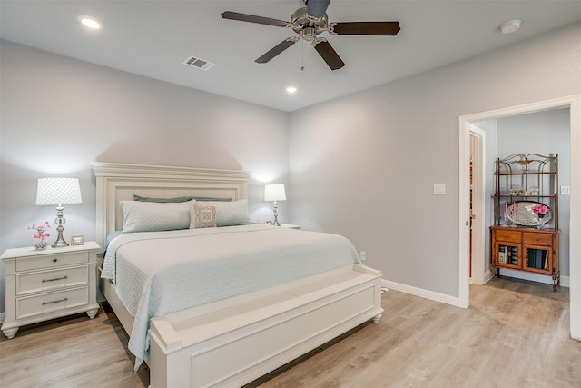 bedroom featuring ceiling fan and light wood-type flooring