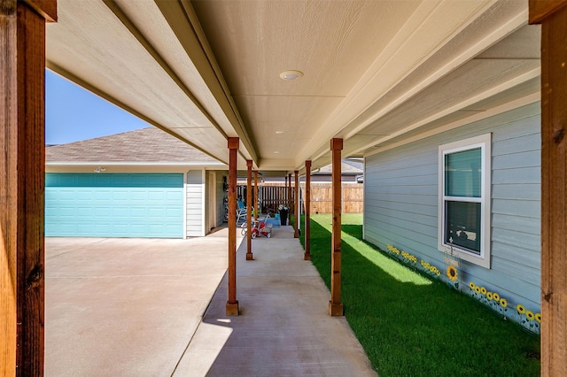 view of patio with a garage