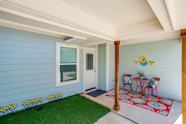 property entrance featuring a porch