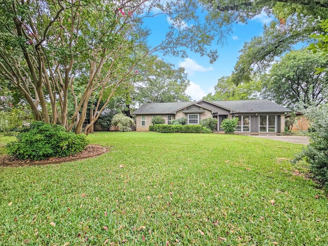 view of front of home with a front yard