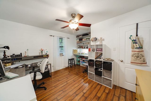 office area featuring dark hardwood / wood-style floors and ceiling fan