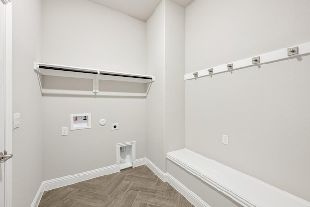 washroom with electric dryer hookup, washer hookup, hookup for a gas dryer, and parquet floors