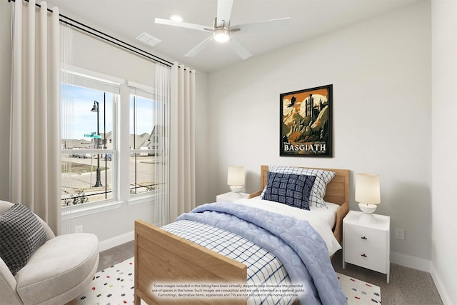 bedroom with ceiling fan and carpet flooring