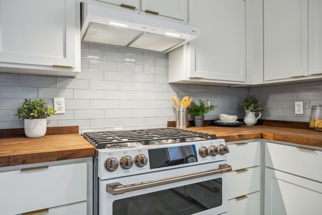 kitchen with decorative backsplash, white cabinetry, wood counters, and high end white range