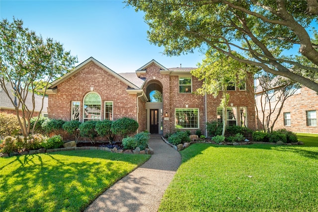 view of front of home with a front yard