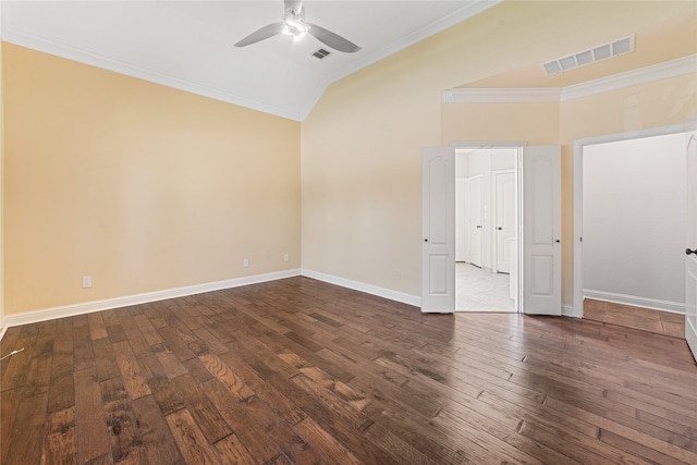 unfurnished room with ceiling fan, ornamental molding, lofted ceiling, and dark wood-type flooring