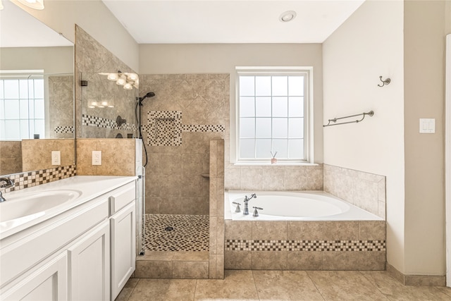 bathroom with vanity, separate shower and tub, and tile patterned floors