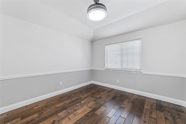 unfurnished room featuring dark hardwood / wood-style floors