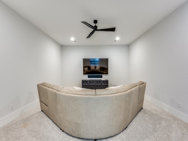 living room with light carpet and ceiling fan