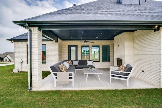 back of house with a patio, ceiling fan, outdoor lounge area, and a yard